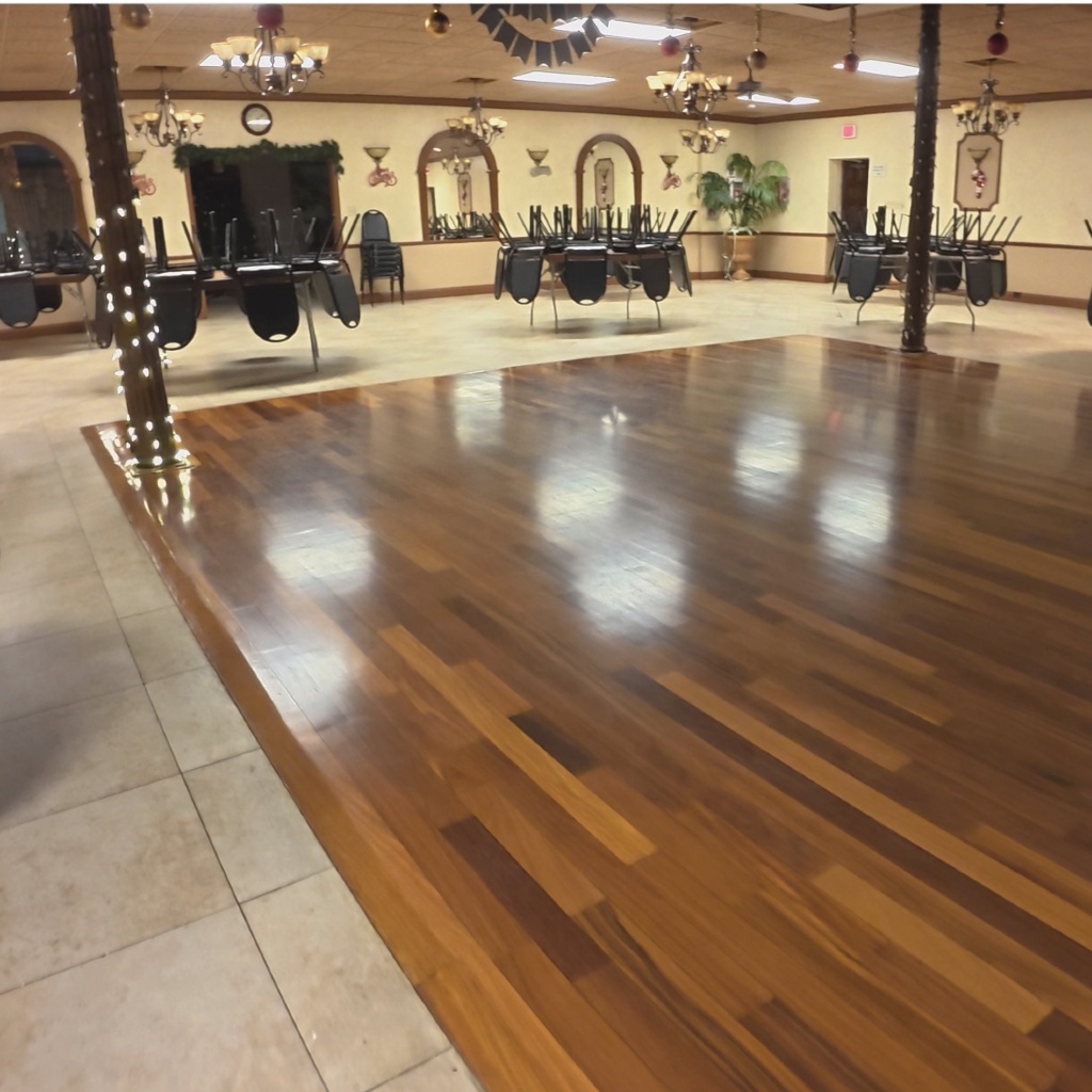 Professional cleaner working on floors