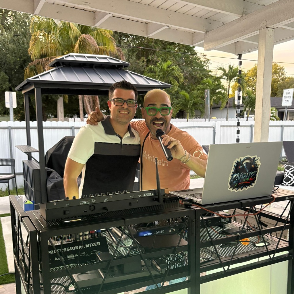 DJ actively mixing music at event