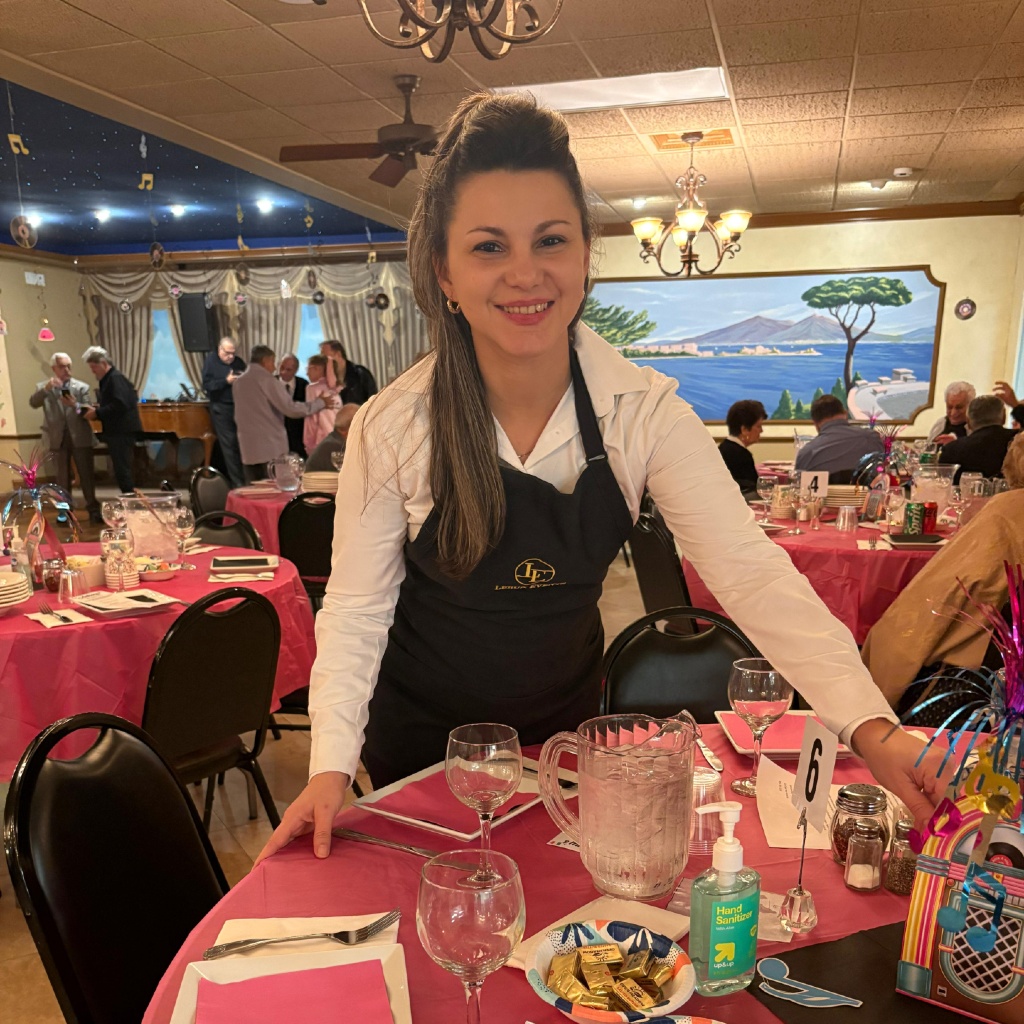 Staff actively serving guests at event